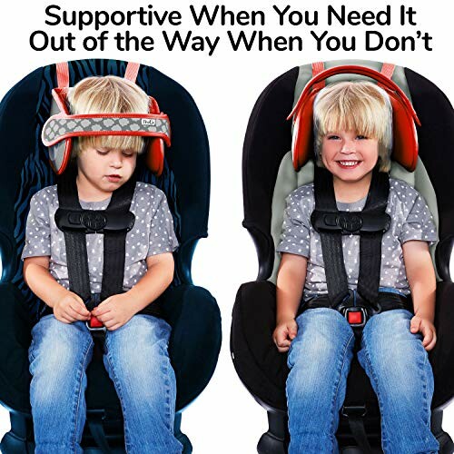 Two children in car seats with head support, one asleep and one awake.