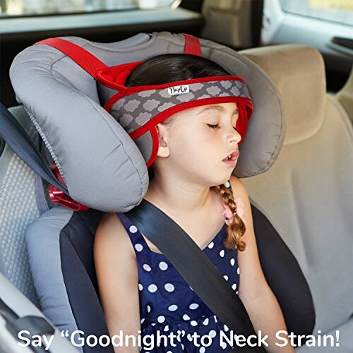 Child sleeping in a car seat with head support