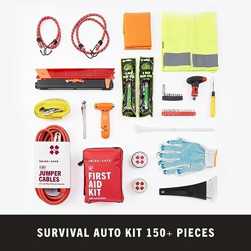 Comprehensive survival auto kit with jumper cables, first aid kit, tools, and safety gear.